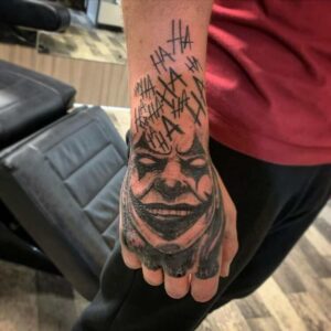 Joker-Inspired Hand Tattoos for Men